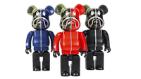 three bearbricks in red, blue and black